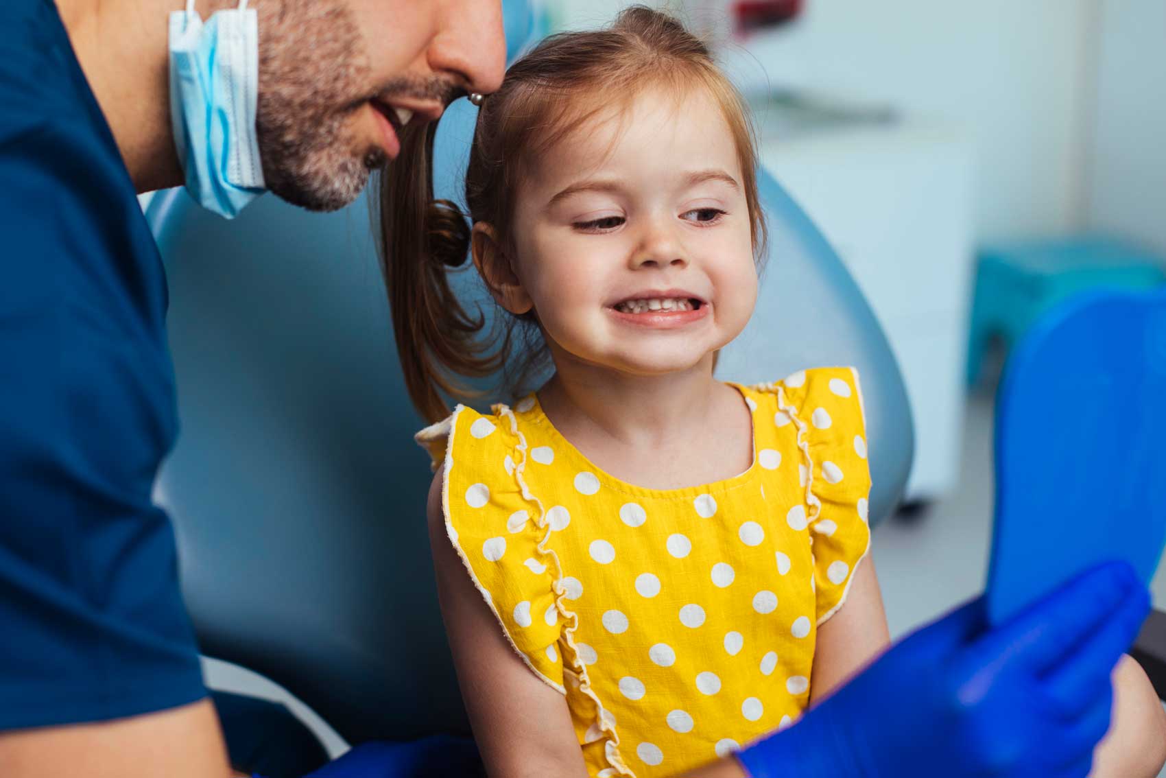 Little girl visiting dentist for general dentist check